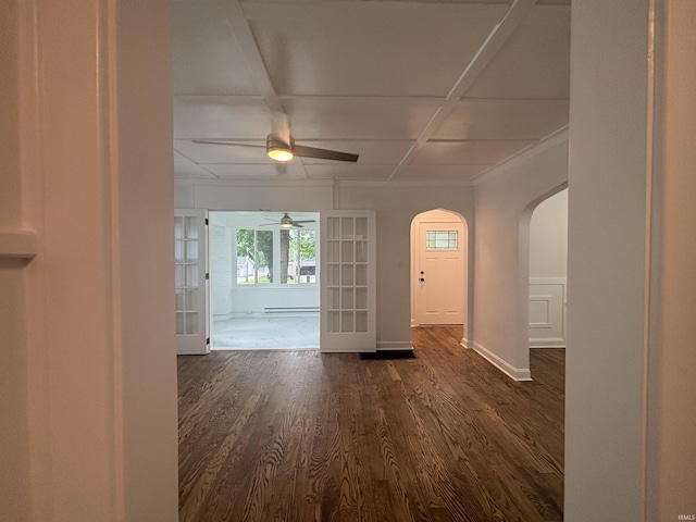 2521 N Red Bank Rd, Evansville, IN 47720 - entryway featuring a ceiling fan, dark wood-type flooring, arched walkways, and a baseboard radiator