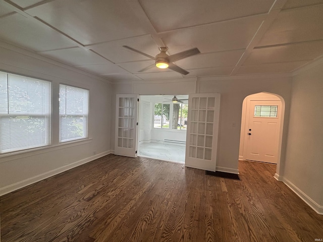 2521 N Red Bank Rd, Evansville, IN 47720 - spare room with ceiling fan, healthy amount of natural light, arched walkways, dark wood-type flooring, and coffered ceiling