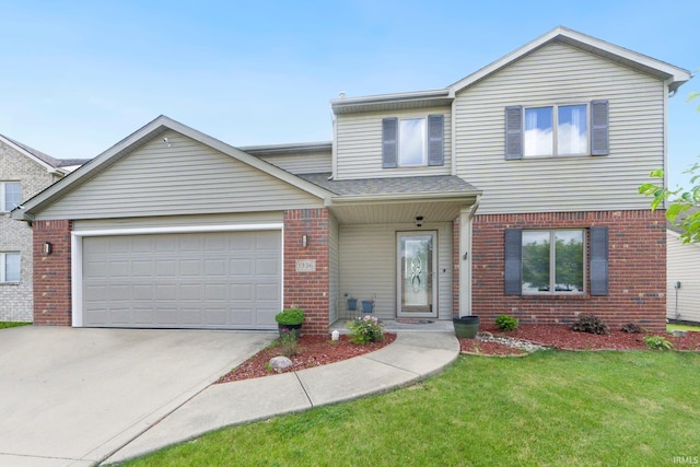 1936 Mark Anthony Xing, Fort Wayne, IN 46818 - traditional-style house with brick siding, driveway, an attached garage, a front lawn, and a shingled roof