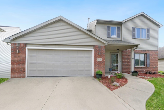 1936 Mark Anthony Xing, Fort Wayne, IN 46818 - traditional home with brick siding, concrete driveway, and a garage