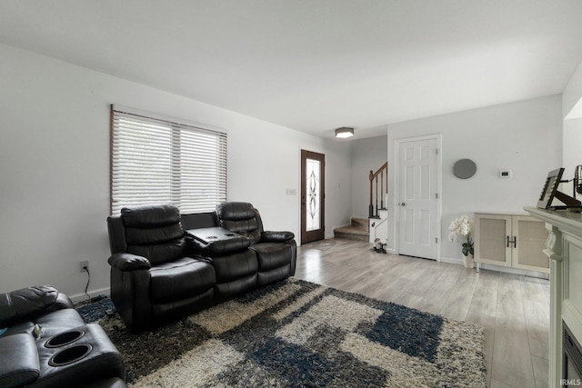 1936 Mark Anthony Xing, Fort Wayne, IN 46818 - living area with stairway and light wood-style flooring