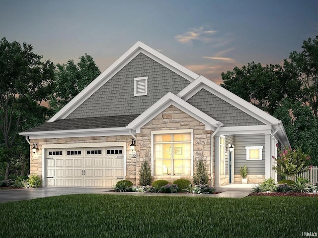 591 Tamarind Dr, West Lafayette, IN 47906 - craftsman inspired home featuring stone siding, concrete driveway, a front lawn, and a garage