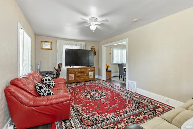 309 E Eckman St, South Bend, IN 46614 - living area featuring ceiling fan and plenty of natural light