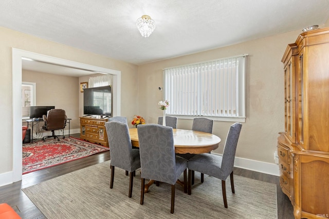 309 E Eckman St, South Bend, IN 46614 - dining space with wood finished floors and an office area