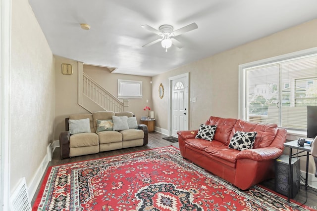 309 E Eckman St, South Bend, IN 46614 - living room with stairway, ceiling fan, and wood finished floors