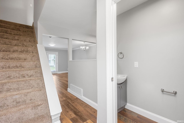 483 N Eddy St Lot # 32, South Bend, IN 46617 - staircase with wood finished floors and a chandelier