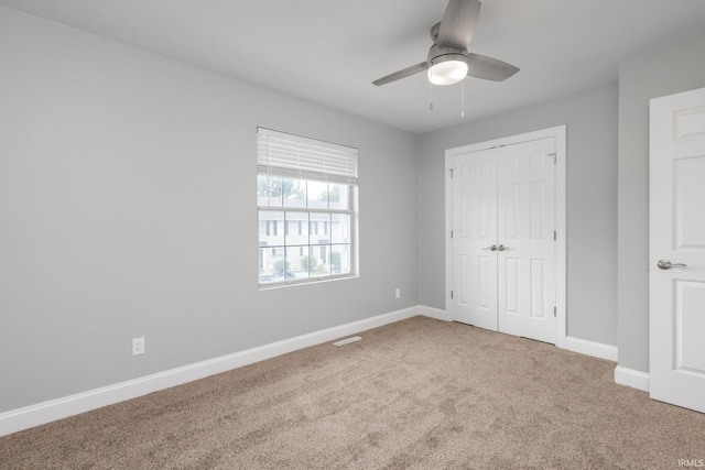 483 N Eddy St Lot # 32, South Bend, IN 46617 - unfurnished bedroom with carpet flooring, a closet, and a ceiling fan