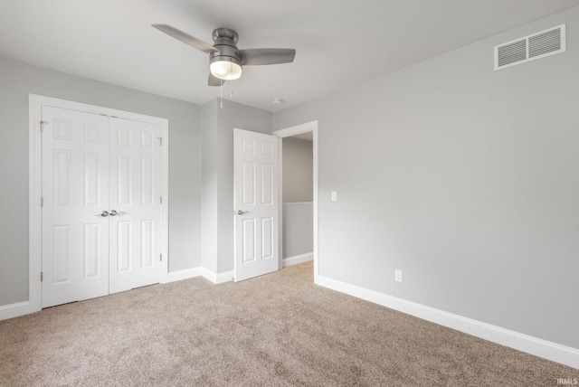 483 N Eddy St Lot # 32, South Bend, IN 46617 - unfurnished bedroom featuring carpet floors, a closet, and a ceiling fan