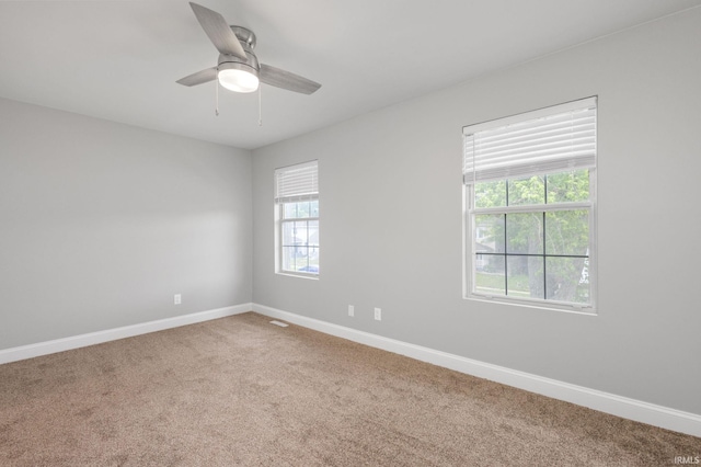 483 N Eddy St Lot # 32, South Bend, IN 46617 - carpeted spare room featuring baseboards and a ceiling fan
