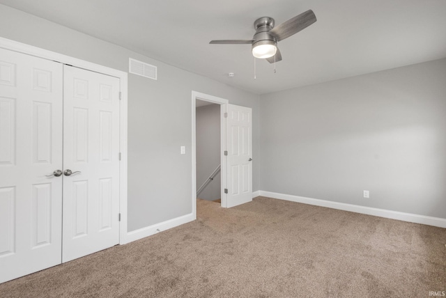 483 N Eddy St Lot # 32, South Bend, IN 46617 - unfurnished bedroom with carpet, a closet, and a ceiling fan