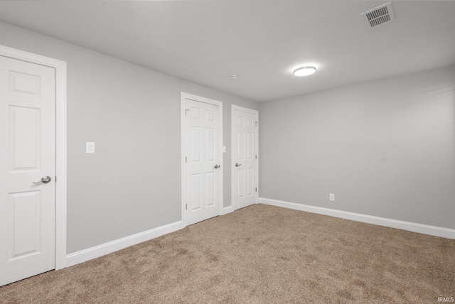 483 N Eddy St Lot # 32, South Bend, IN 46617 - unfurnished bedroom featuring carpet and baseboards