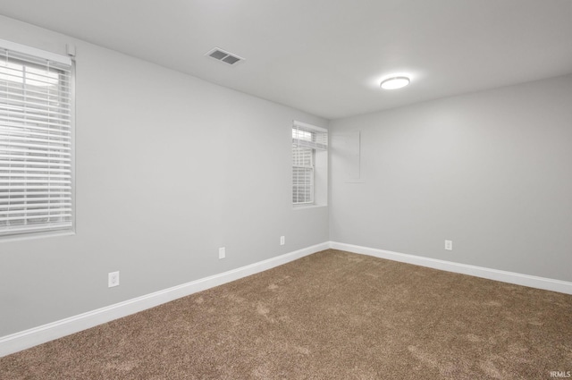 483 N Eddy St Lot # 32, South Bend, IN 46617 - unfurnished room featuring dark colored carpet and baseboards