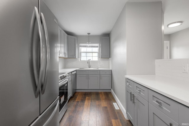 483 N Eddy St Lot # 32, South Bend, IN 46617 - kitchen featuring appliances with stainless steel finishes, gray cabinets, and tasteful backsplash