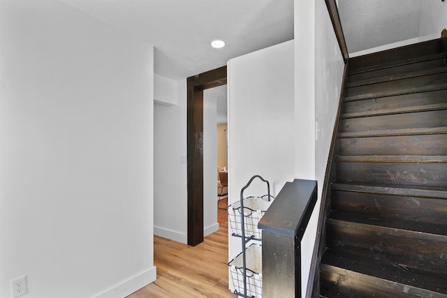 54054 N Ironwood Rd, South Bend, IN 46635 - staircase with baseboards and wood finished floors