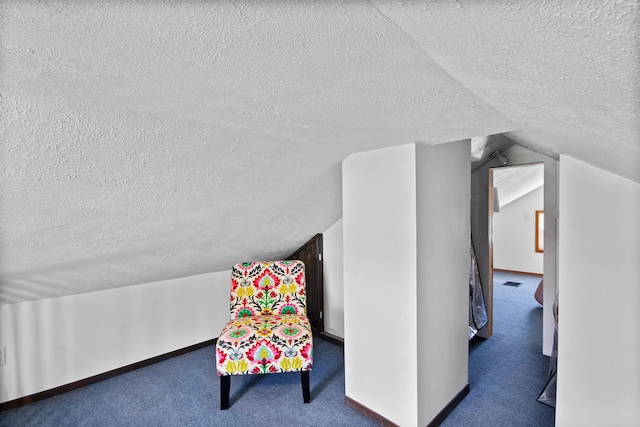 54054 N Ironwood Rd, South Bend, IN 46635 - living area with a textured ceiling, lofted ceiling, and carpet floors