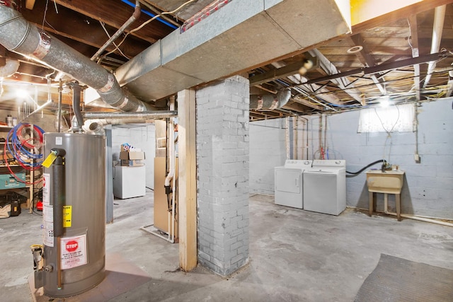 54054 N Ironwood Rd, South Bend, IN 46635 - unfinished below grade area featuring water heater and independent washer and dryer