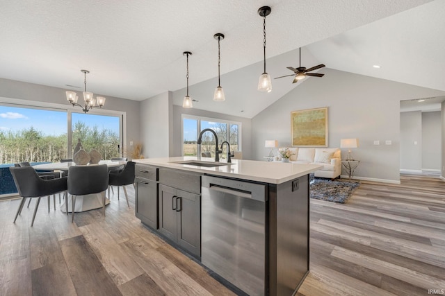 5165 Greyson Heights Dr, Auburn, IN 46706 - kitchen featuring dishwasher, light wood-type flooring, a chandelier, ceiling fan, and light countertops