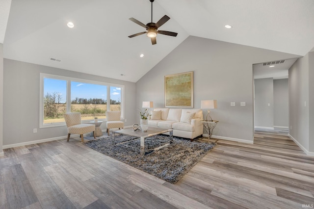 5165 Greyson Heights Dr, Auburn, IN 46706 - living area featuring high vaulted ceiling, ceiling fan, wood finished floors, and recessed lighting