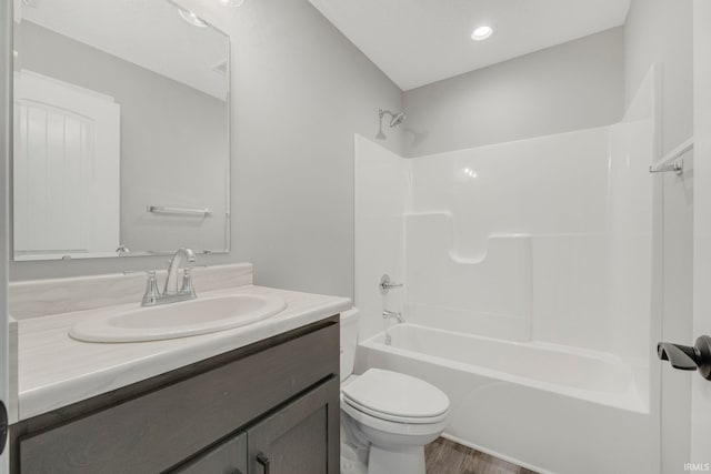 5165 Greyson Heights Dr, Auburn, IN 46706 - bathroom with vanity,  shower combination, and wood finished floors