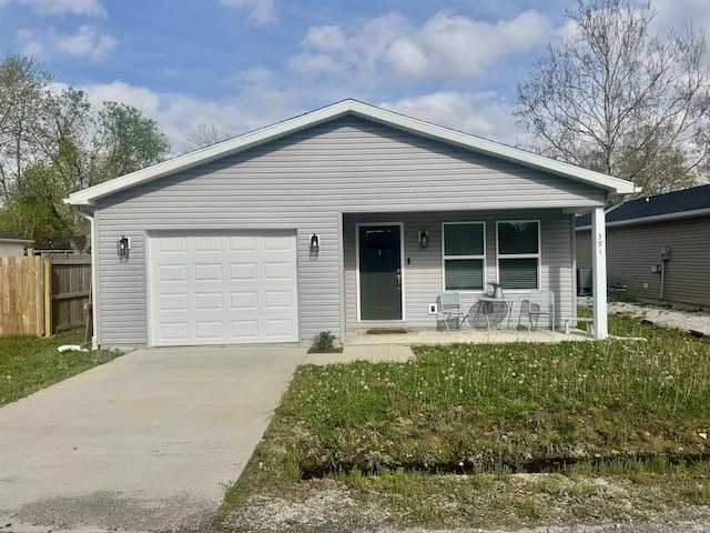 391 Hel Mar Dr, Mitchell, IN 47446 - ranch-style home featuring covered porch, driveway, and a garage