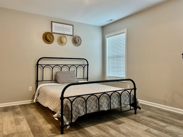 391 Hel Mar Dr, Mitchell, IN 47446 - bedroom with wood finished floors and baseboards