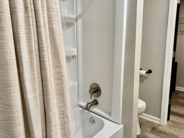 391 Hel Mar Dr, Mitchell, IN 47446 - bathroom with shower / bath combo and wood finished floors