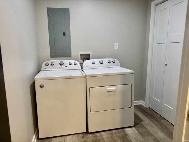 391 Hel Mar Dr, Mitchell, IN 47446 - laundry area with electric panel, independent washer and dryer, and wood finished floors
