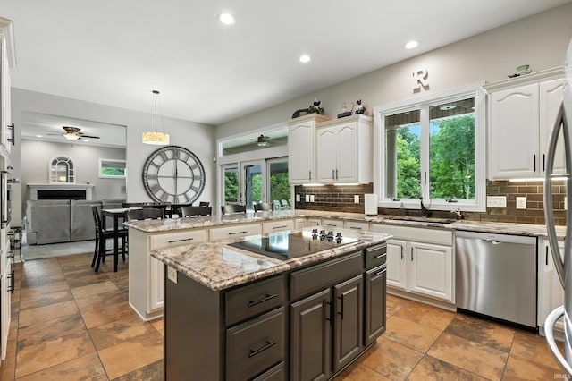 17325 N State Road 1st Rd, Spencerville, IN 46788 - kitchen featuring stainless steel dishwasher, ceiling fan, black electric stovetop, white cabinets, and recessed lighting