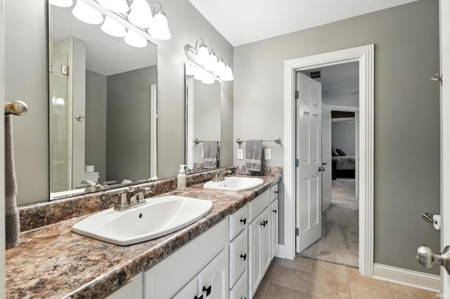 17325 N State Road 1st Rd, Spencerville, IN 46788 - ensuite bathroom featuring double vanity and tile patterned floors
