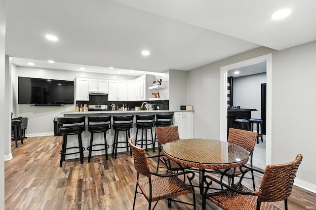 17325 N State Road 1st Rd, Spencerville, IN 46788 - dining room featuring wet bar, recessed lighting, and wood finished floors
