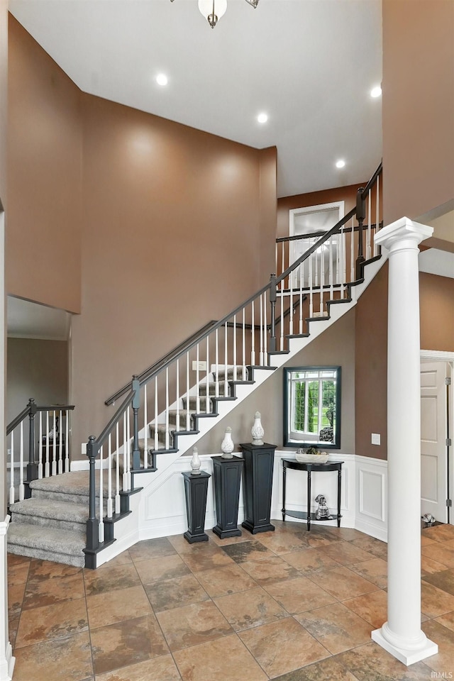 17325 N State Road 1st Rd, Spencerville, IN 46788 - stairs featuring a high ceiling, recessed lighting, and stone finish floors