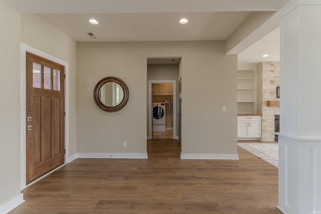 2843 Alex Ct, Newburgh, IN 47630 - foyer with washing machine and clothes dryer, wood finished floors, and recessed lighting
