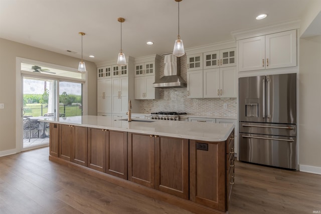 2843 Alex Ct, Newburgh, IN 47630 - kitchen featuring high end fridge, wall chimney range hood, light countertops, dark wood-style floors, and recessed lighting