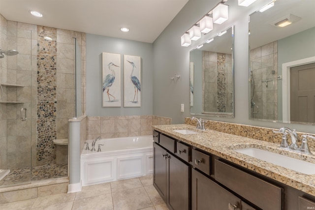 2843 Alex Ct, Newburgh, IN 47630 - full bathroom featuring a stall shower, a bath, double vanity, tile patterned flooring, and recessed lighting
