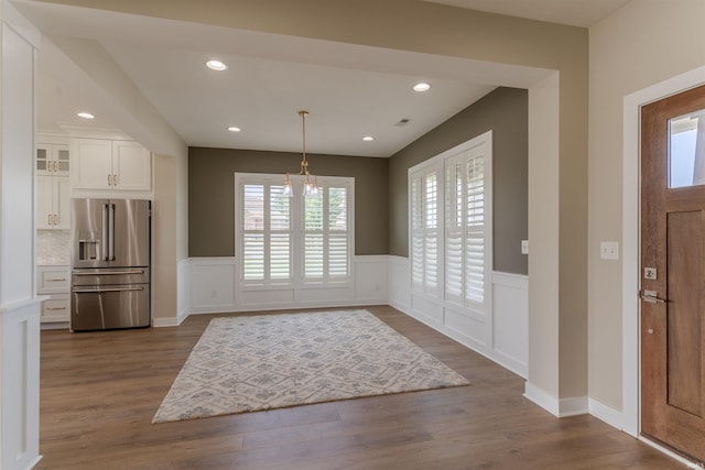 2843 Alex Ct, Newburgh, IN 47630 - entryway with wainscoting, a chandelier, dark wood-style floors, recessed lighting, and a decorative wall