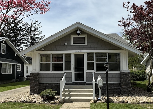 133 Crescent St, Elkhart, IN 46516 - view of front facade with a sunroom