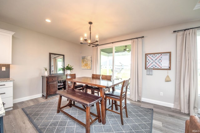 5358 Maize Dr, West Lafayette, IN 47906 - dining room with a chandelier, dark wood-style floors, and recessed lighting