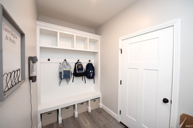 5358 Maize Dr, West Lafayette, IN 47906 - mudroom featuring dark wood-type flooring and baseboards