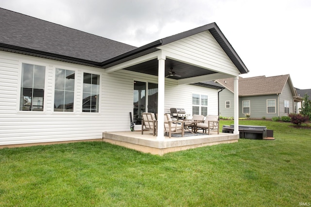 5358 Maize Dr, West Lafayette, IN 47906 - back of house featuring a ceiling fan, roof with shingles, a patio area, a yard, and an outdoor hangout area