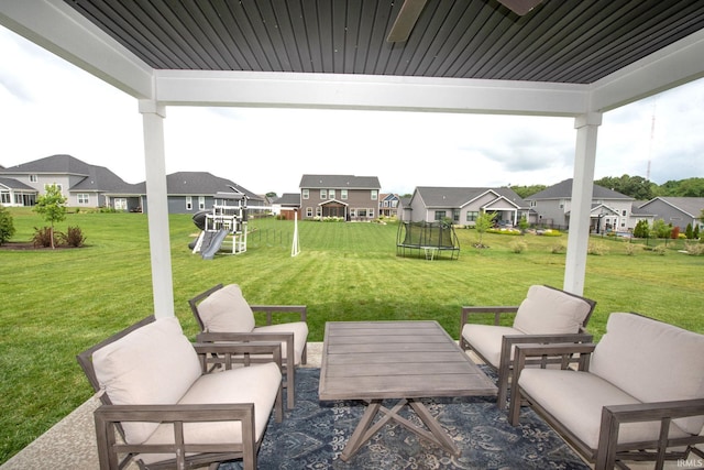 5358 Maize Dr, West Lafayette, IN 47906 - view of patio / terrace featuring an outdoor hangout area, a residential view, a trampoline, and a playground