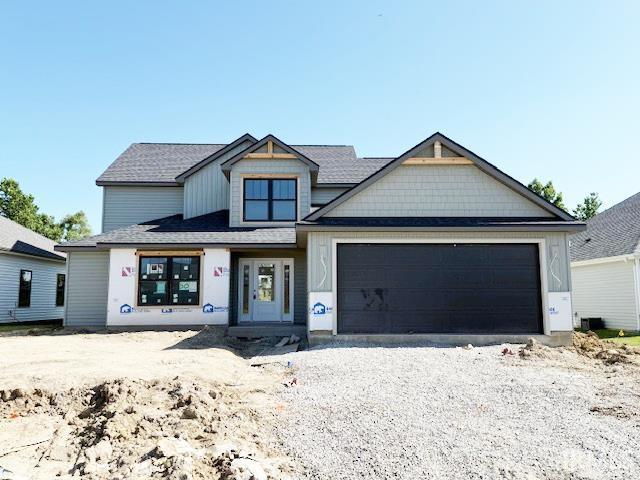13315 Halen Hill Ct, Fort Wayne, IN 46818 - view of front of house with a garage and driveway