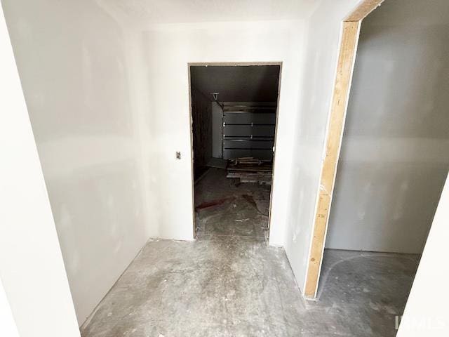 13315 Halen Hill Ct, Fort Wayne, IN 46818 - corridor with unfinished concrete flooring