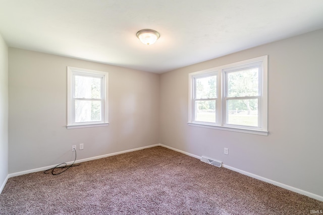 6321 Butt Rd, Fort Wayne, IN 46818 - carpeted spare room featuring plenty of natural light