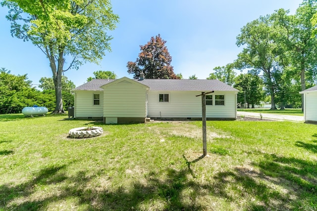 6321 Butt Rd, Fort Wayne, IN 46818 - rear view of property featuring a lawn and crawl space