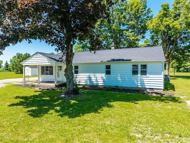 6321 Butt Rd, Fort Wayne, IN 46818 - view of front of house with a front yard, a patio, crawl space, and a chimney