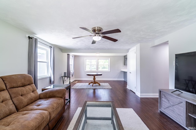 6321 Butt Rd, Fort Wayne, IN 46818 - living area featuring a ceiling fan and dark wood-style floors