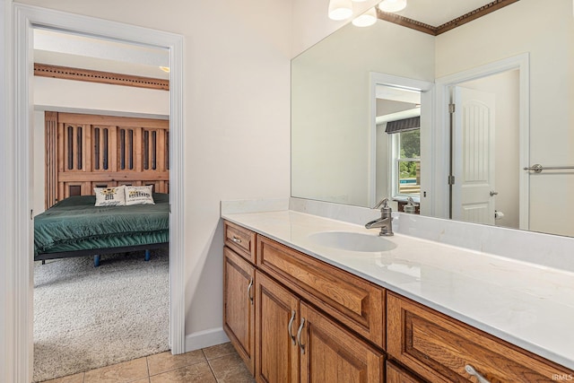 8196 E Walnut Rdg, New Carlisle, IN 46552 - ensuite bathroom featuring vanity and tile patterned flooring