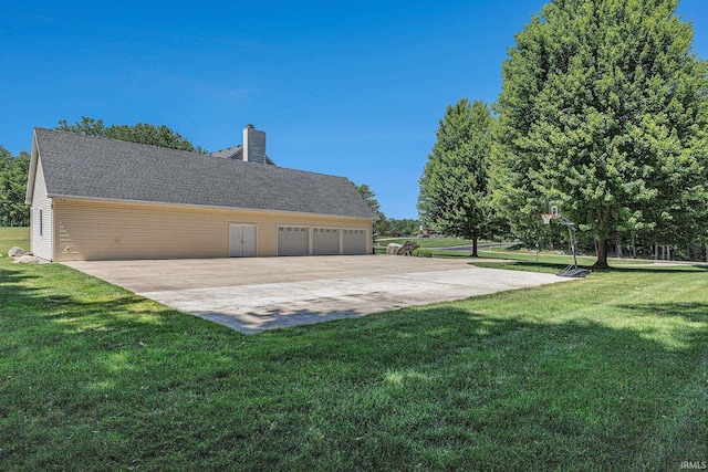8196 E Walnut Rdg, New Carlisle, IN 46552 - view of side of home featuring a chimney and a yard