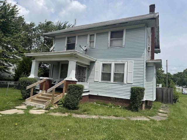 527 E Leith St, Fort Wayne, IN 46806 - view of front of house with a chimney and a porch