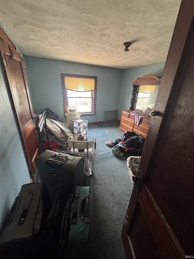 527 E Leith St, Fort Wayne, IN 46806 - carpeted bedroom featuring a textured ceiling and multiple windows